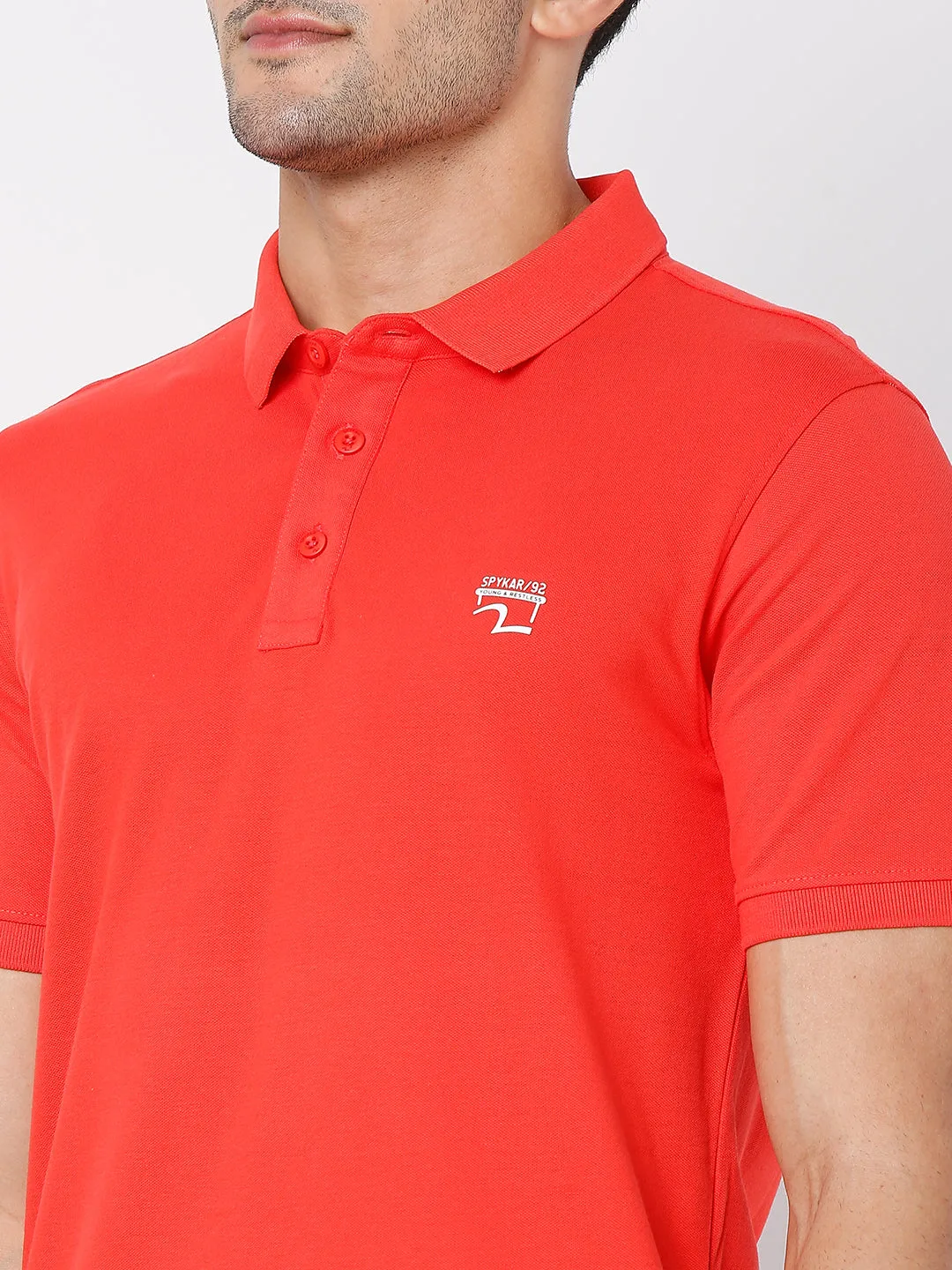 Spykar Men Deep Coral Cotton Half Sleeve Plain Casual Polo Tshirt